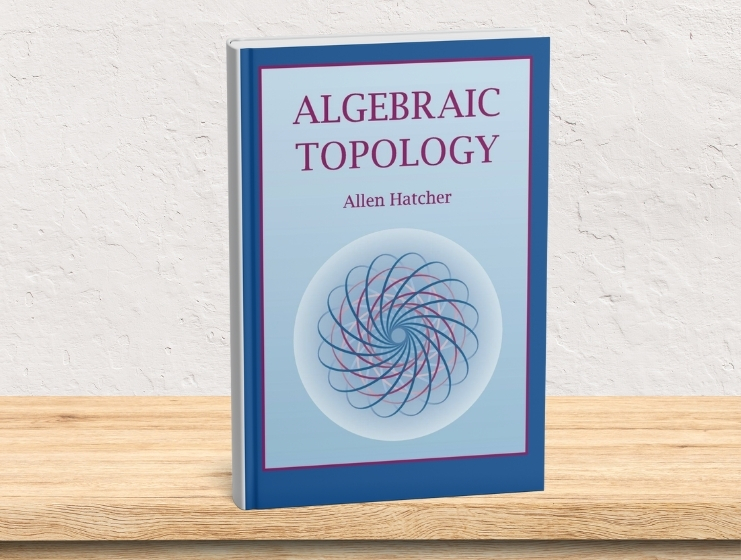 A hardcover copy of Algebraic Topology by Allen Hatcher placed upright on a wooden surface